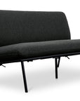 The Salma Outdoor Sofa by Moes is a modern black armless piece with a minimalist metal frame and plush, quick-dry foam cushions in dark Olefin fabric, shown on a white background.