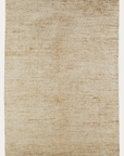 The Acacia Rug - Fawn by Armadillo&Co is a rectangular beige woven rug featuring a subtle, slightly uneven texture and a natural, minimalist look. Handmade for lasting quality.