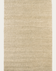 The Mojave Rug - Cashew by Armadillo&Co is a rectangular, light beige rug with a subtle textured pattern and short fringes on both ends. Its soft, neutral look complements various decor styles.