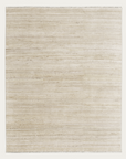 The Odessa Rug - Arborio by Armadillo&Co is a large rectangular beige hand-knotted rug, featuring subtle horizontal lines and a textured look, shown on a plain light background.