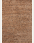 The Meadow Rug - Tamarillo by Armadillo&Co is a rectangular, textured area rug in warm medium brown with a subtle mottled look and hints of checkerboard weave, inspired by classic Armadillo rugs.