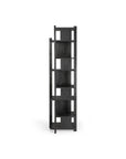 The Ethnicraft Abstract Column is a tall, modern black wooden bookshelf with six open shelves, crafted from FSC certified teak, shown against a plain white background.