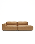 The Baker Modular Sofa | Leather • M1 by Wooden Stories features a modern, low-profile design in brown leather with wide, blocky arms and plush cushions, shown against a plain white background.