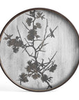 The Ethnicraft Blossom Wooden Tray - Round / Small features a metallic silver surface etched with delicate flowering branches and leaves, blending nature-inspired minimalism with classic European style.