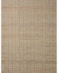 The Cornwall Rug by Loloi features a rectangular, woven jute and wool design in light grey and natural tones with subtle linear patterns and lighter borders for an organic look.