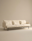 The SOBU Cherry Sofa | Fabric is a modern, minimalist 3-seater with Danish lines and slim black legs, shown with three seat cushions against a plain beige background—ideal for contemporary spaces.