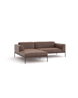 The Department Modular Sofa | Leather • M1 by Wooden Stories is a modern brown sectional with a left chaise, low backrests, slim armrests, black metal legs, and a solid wood base inspired by Danish design, shown on a plain white background.