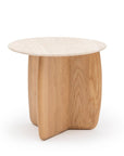 The Eden Side Table by Wooden Stories features a round stone top and a solid wood base with two interlocking curved panels, inspired by Scandinavian design, shown against a white background.