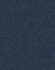 Close-up of the N701 Modular Sofa - Blue by Ethnicraft, showcasing its textured, dark blue woven fabric with a uniform, grid-like pattern. The thick and durable material makes it an excellent choice for upholstering this European modular sectional sofa.
