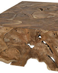 The Vert Coffee Table by Noir Trading Inc. is crafted from solid natural teak, showcasing a rustic finish with unique organic patterns and irregular, jagged edges for a distinctive look.
