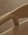 A close-up of the Inlay Counter Stool | Leather Seat by Wooden Stories, crafted from solid oak and inspired by the Danish Collection.