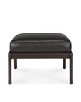 The Ethnicraft Jack Footstool in black leather features a cushioned top and dark wood legs with a mahogany varnish, shown front-facing on a white background, reflecting subtle Scandinavian modernism.