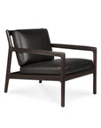 The Ethnicraft Jack Lounge Chair - Black Leather features a dark wooden frame, black leather seat and backrest, and clean lines inspired by Scandinavian modernism—a minimalist icon from the Jack Lounge collection.