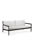 The Jack Outdoor 2 Seater Sofa by Ethnicraft features a black teak frame and off-white cushions. Its clean, minimalist lines and contemporary design are highlighted against a plain white background.