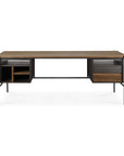 The Ethnicraft Oscar Desk - Teak with 2 Drawers features black metal legs, open left shelves, and two right drawers, all set against a plain white background for a refined European look.