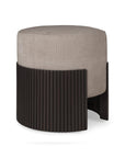 The Ethnicraft Roller Max Pouf features a modern round design with a mahogany wood, semi-circular base and vertical slats, topped with a light beige upholstered cushion, shown against a white background.