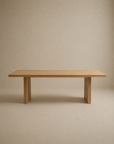 The SOBU Tommaso Dining Table - Wood Legs features a modern rectangular design with a smooth solid wood surface and two wide, flat legs, shown against a light beige backdrop.