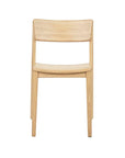 The Wooden Stories Poise Dining Chair in light oak features a straight backrest and four legs, shown from the front against a plain white background.