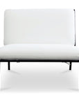 The Salma Outdoor Lounge Chair by Moes features thick white olefin cushions and slim black metal legs, displayed from the front against a plain white background.