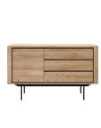 The Ethnicraft Shadow Sideboard with Legs - 53 features European oak with a natural finish, three right drawers, a left cabinet door, and slim black metal legs.