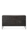 The Ethnicraft Tabwa Sideboard - 3 door features dark wood, slender black legs, and front panels with intricate linear geometric motifs inspired by Tabwa culture, all shown against a plain white background.