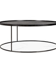 The Ethnicraft Tray Coffee Table is a modern round black table with a thin metal frame, flat smooth tabletop, and minimalist open design inspired by the Ethnicraft Tray Collection.
