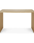 The Ethnicraft U Desk - Oak is a minimalist rectangular solid oak desk with a light finish, flat top, and panel legs; features discreet cable management and is shown against a white background.