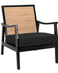 The Lichtenstein Chair by Noir Trading Inc. features a black Sungkai/Mindi wood frame, woven rattan backrest, thick black cushion, and straight angled arms for a modern minimalist look.