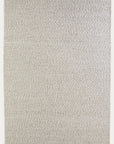 The Andes Rug - Parchment by Armadillo&Co is a rectangular, light beige handmade wool rug featuring a subtle, textured pattern and minimal design—ideal for modern, neutral interiors and capturing the signature style of Armadillo rugs.