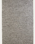 The Andes Rug - Pumice by Armadillo&Co is a rectangular, light gray shaggy area rug with a plush, textured surface, displayed against a plain white background.