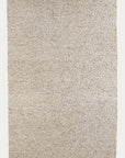 A rectangular Andes Rug - Rye by Armadillo&Co, in light beige with a soft, plush surface and textured finish, photographed from above on a neutral background.
