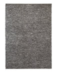 The Andorra Rug - Pepper by Armadillo&Co is a rectangular, dark gray handmade wool rug with a subtle mottled pattern and modern look, shown on a white background.