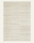 The Armadillo&Co Aspen Rug - Natural is a rectangular, hand-knotted rug crafted from 100% wool. It features a light beige hue with a subtle textured pattern and soft, neutral look, shown on an off-white background.