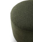 A close-up of the Barrow Pouf - Pine / Small by Ethnicraft, featuring round, green, textured fabric crafted from premium Italian materials—showing only the top and part of the side against a white background.