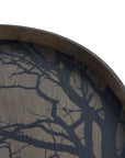 Close-up of the Ethnicraft Black Tree Wooden Tray - Round / Large, featuring a dark brown rim and tree branch silhouette against a plain white background, showcasing refined European design.