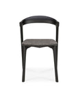 Front view of the Bok Dining Chair - Black Oak with Grey Fabric by Ethnicraft, showing its modern black oak frame, curved backrest, and padded grey seat, set against a white background.