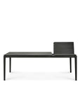 The Ethnicraft Bok Extendable Dining Table in black features a minimalist design with four slender legs and is shown against a white background.