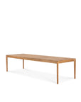 The Bok Outdoor Dining Table by Ethnicraft features a long, rectangular design in natural teak with a smooth surface and four straight, tapered legs, shown against a plain white background.