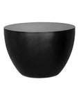 The Moes Insitu Side Table - Black, with a round design, minimalist style, matte finish, and subtly tapered base, is photographed against a plain white background.