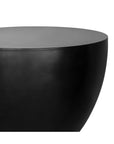 Close-up of the Moes Insitu Side Table - Black, featuring a round, minimalist design with a smooth matte concrete finish. The image focuses on the upper half of the table against a plain white background.