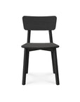 The Ethnicraft Casale Dining Chair - Black is a modern European oak chair with a rectangular backrest and four straight legs, shown on a white background. Ideal for complementing your Ethnicraft dining table.