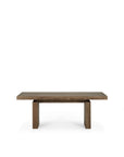 The Ethnicraft Double Extendable Dining Table in natural teak features a thick rectangular top and two wide, rectangular legs, shown here in unfinished teak against a plain white background.