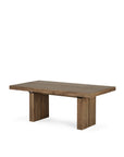 The Ethnicraft Double Extendable Dining Table in natural teak features a thick, flat rectangular top and two wide, sturdy block legs, shown against a plain white background.