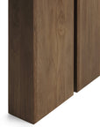 Close-up of two vertical rectangular natural teak panels with visible grain, standing side by side with a narrow gap—part of the Ethnicraft Double Extendable Dining Table—set against a white background.