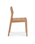 Side view of the Ethnicraft EX1 Outdoor Dining Chair in teak, featuring a flat seat, slatted backrest, and straight legs, shown against a plain white background.