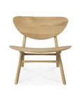 The Ethnicraft Eye Lounge Chair - Oak features European oak construction, a curved wide backrest, gently sloped seat, and rounded legs. Its minimalist design reflects Ethnicraft’s signature style, presented against a white background.