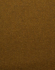 Close-up of a textured, golden-brown surface with a fine, granular look—reminiscent of Wooden Stories' Fabric + Leather Swatches, showing consistent color and texture throughout.