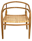 The Finley Chair by Noir Trading Inc. is a hand-crafted teak chair with a curved backrest and arms, woven natural rattan seat, and four straight legs, shown from the front.