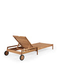 The Ethnicraft Jack Outdoor Adjustable Lounger in teak features a slatted wooden design, adjustable backrest, and two black wheels for mobility, all displayed against a white background.