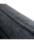 Close-up of the Morgan Outdoor Chair by Moes, showing its dark gray Olefin fabric upholstery with visible stitching. The detailed seam highlights the chairs textured finish and durable construction.